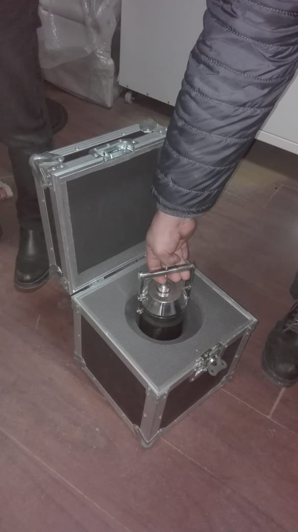 Radioactive material transport container